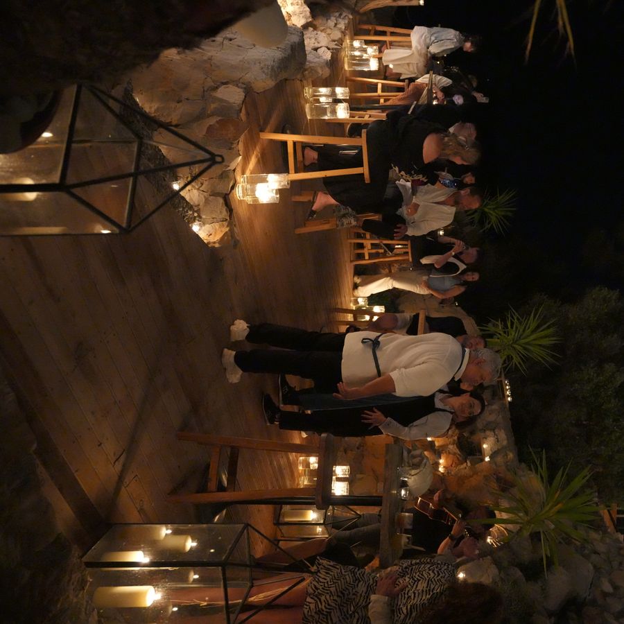 Evening gathering by candlelight at Perdue